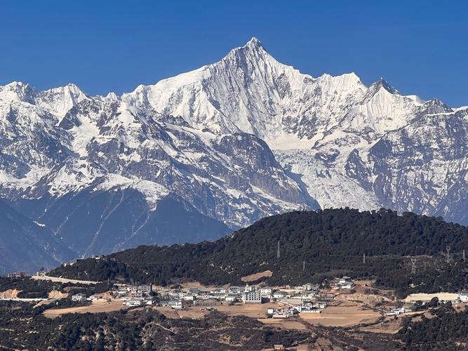 梅里雪山雾浓顶摄影技巧